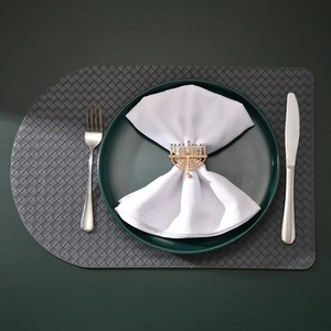 Close-up of golden Menorah napkin ring with crystal rhinestones on a table