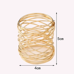 Golden wire mesh napkin ring with bird nest design for elegant table decoration