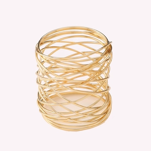 Golden woven wire metal napkin ring with hollow modern design for dining table decor