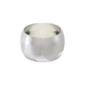 Silver hammered metal napkin ring with textured surface on white background