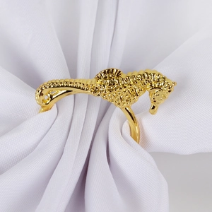 Golden seahorse napkin ring made of zinc alloy with detailed scale textures for table decor