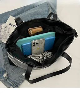Top-down view of spacious tote bag interior showing compartments and large storage capacity