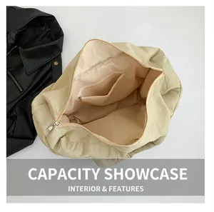 Macro view of large capacity tote bag interior with a secure gold zipper pocket