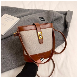 Vintage leopard trim bucket bag in beige canvas and brown leather with gold hardware