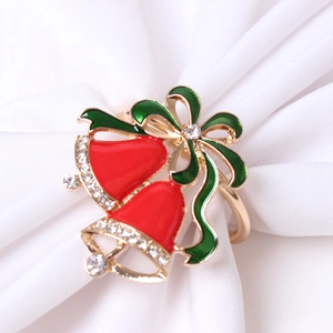 Rond de serviette de Noël doré avec cloches émaillées rouges, nœud vert et cristaux