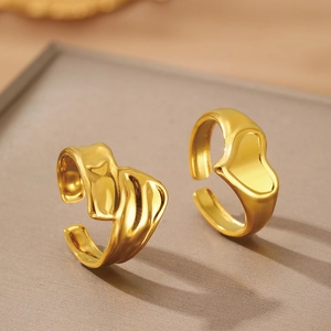 Elegant gold plated heart shaped open rings with textured and polished finishes