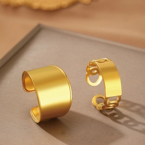 Exquisite gold stainless steel wide band heart and hollow chain rings on tray