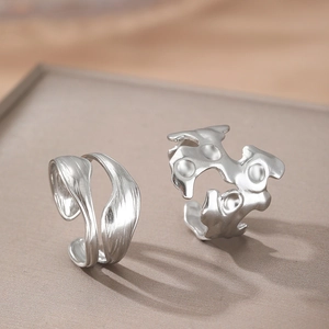 Adjustable silver 304 stainless steel rings with irregular molten lava and wave designs