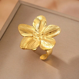 Elegant gold flower ring with textured petals and adjustable band for women