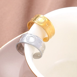 Anelli regolabili in acciaio al titanio oro e argento con design vintage goffrato