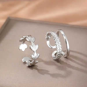 Leaf textured stainless steel rings set with adjustable double-layer band design