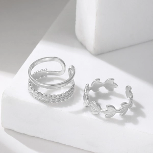 Minimalist silver leaf and braided open ring set for women on white stones