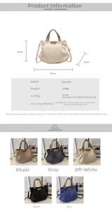 Detailed view of large canvas tote bag showing pleated design and dual handle straps