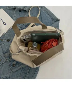 Spacious canvas tote bag interior showing capacity for tablets and essentials