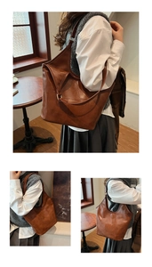 Detailweergave van een vintage donkerbruine shopper tas met vierkant patchwork en schouderriem