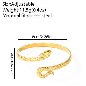 Detailed view of adjustable golden stainless steel snake cuff with textured grid pattern