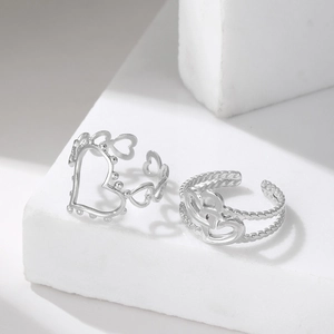 Vintage hollow heart stainless steel adjustable rings with intricate court style patterns