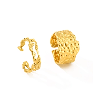 Gold-plated stainless steel ring set featuring irregular fluid lines and hammered textures