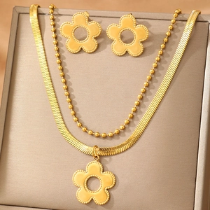 Elegant gold-tone stainless steel jewelry set featuring a double-layer flower necklace and studs