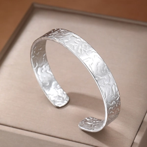 Silver stainless steel wide open cuff bangle with hammered texture for women