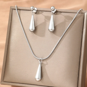 Polished stainless steel water drop jewelry set with matching necklace and earrings