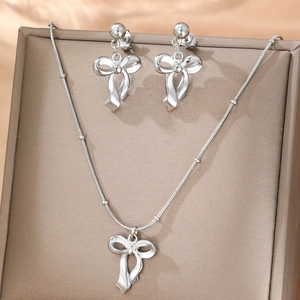Parure bijoux nœud argent avec collier chaîne serpent et boucles d'oreilles clous