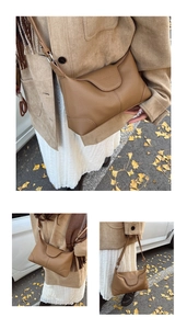 Detailed view of brown lychee grain leather hobo shoulder bag in autumn outdoor setting