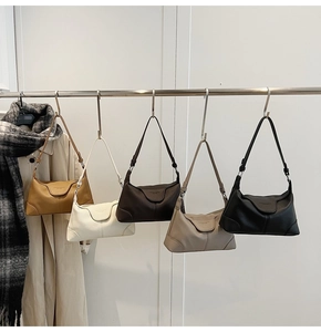Detailed view of fashionable leather shoulder bags in five versatile autumn colors