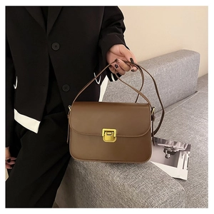 Brown vintage square flap shoulder bag with gold clasp and leather strap for women