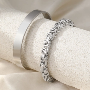 Silver stainless steel Byzantine chain and polished cuff bracelet set on silk