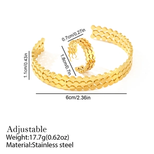 Detail view of 18K gold plated stainless steel adjustable cuff bracelet and ring set