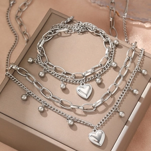 Ensemble collier et bracelet double couche en acier inoxydable avec pendentifs en cœur