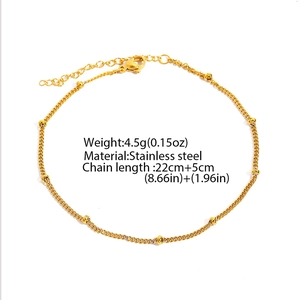 Detailed view of adjustable stainless steel bead anklet with gold finish and lobster clasp