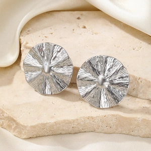 Retro silver textured round stud earrings with pleated metal design on stone and silk
