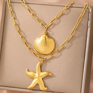 Colliers bohèmes dorés avec pendentifs étoile de mer et coquillage et chaîne trombone