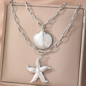 Collier double couche argenté avec pendentif étoile de mer et coquille bohème