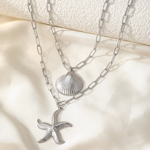 Collier double rang bohème argenté avec pendentifs étoile de mer et coquillage