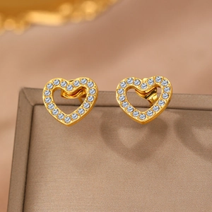 Elegant gold heart-shaped stud earrings with sparkling crystals for daily wear