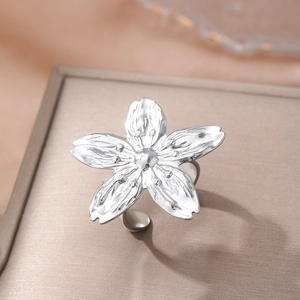 Elegant silver cherry blossom open ring with textured petals and adjustable band