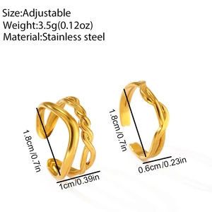 Macro shot showing dimensions of gold stainless steel woven twisted open rings