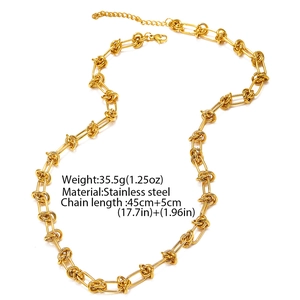Detail of gold-tone stainless steel knot chain necklace with adjustable lobster clasp closure