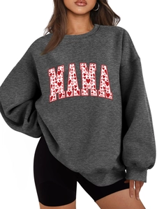 Detail of MAMA letter print with heart patterns on a gray crewneck sweatshirt