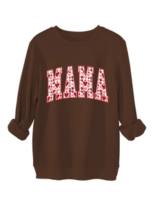 Detail of the MAMA lettering with red and pink heart patterns on dark brown sweatshirt