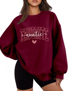 Close-up of ribbed neckline and Favorite Auntie heart print on burgundy sweatshirt
