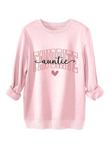 Detail of light pink sweatshirt featuring Favorite Auntie print and ribbed cuffs