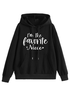 Detail of printed text and kangaroo pocket on black cotton hooded sweatshirt