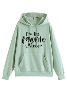 Close-up of mint green hoodie featuring black I'm The favorite Niece print and heart icons