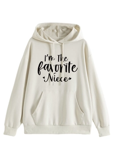 Detailed view of black lettering print on cream oversized women's hoodie with hood