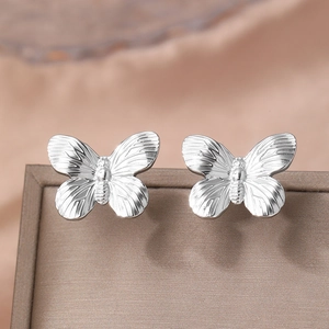 French vintage silver butterfly stud earrings in stainless steel with textured wings