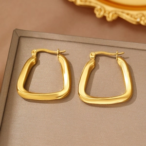 Modern minimalist gold U-shaped hoop earrings made of polished stainless steel for women